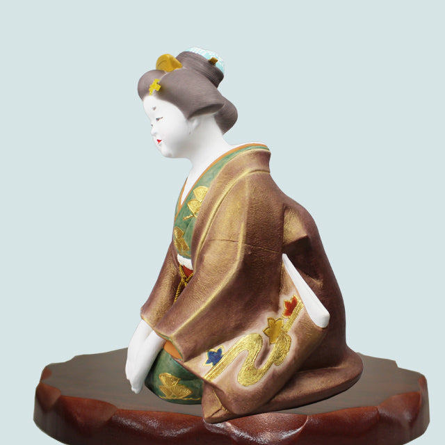 Hakata Doll Good Fortune depicting a traditional craftsman Ueki Susumu's Ofuku-san in detailed kimono.