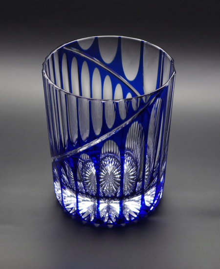 Hayate Rock glass with asymmetrical blue crystal design featuring diagonal Kamaboko carving and intricate reflections.