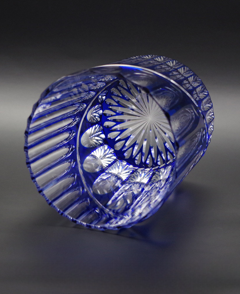Hayate Rock glass showcasing blue crystal with Kamaboko carving and asymmetrical diagonal upward design.