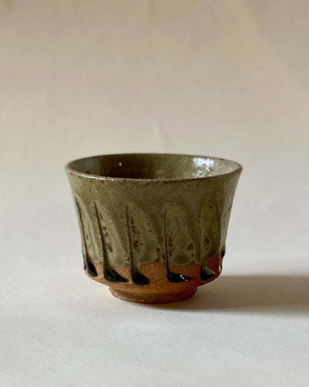 Blue Karatsu teacup with deep green glassy glaze and iron black dots, 8cm diameter and 6cm height.