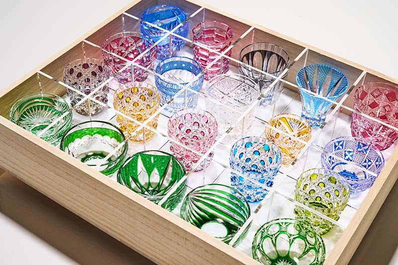 Edo Kiriko Special Selection Sake Cups, Set of 20, colorful handcrafted glass cups in a wooden box.