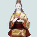 Hakata Doll Tea ceremony by Susumu Ueki, a 23cm tall traditional Japanese figurine in kimono holding tea bowl.