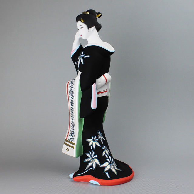 Hakata Presentation showing Hakata Doll Hakata Kenjo by Kenju in black kimono with floral design, 38cm tall.