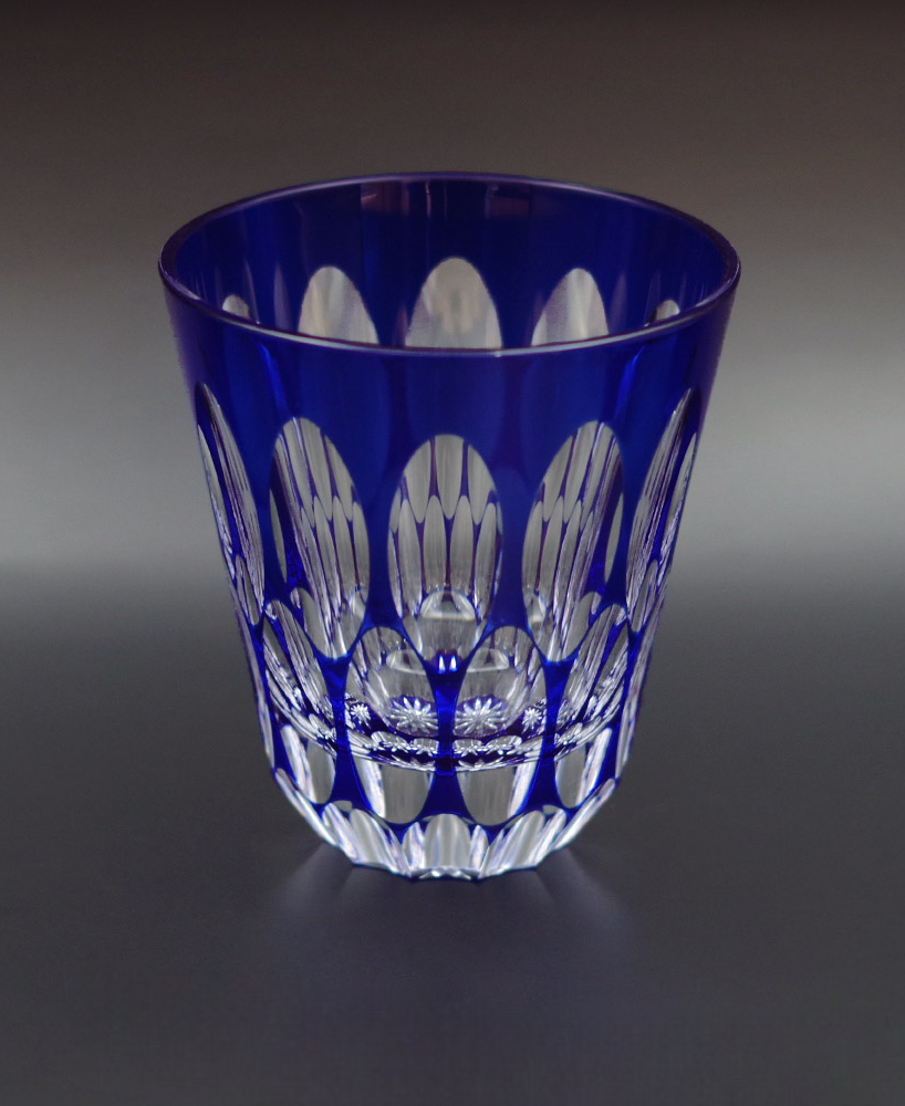 Free Glass Ni-Tama featuring blue crystal glass with oval bead cuts creating a glittering diamond-like pattern.